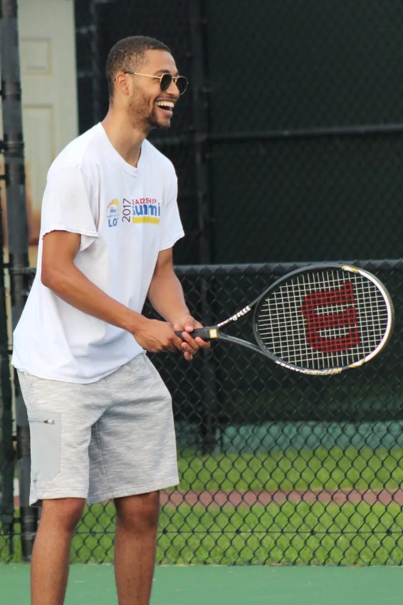 Adult tennis player practicing his ready position during a Tennis 101 lesson in Indianapolis